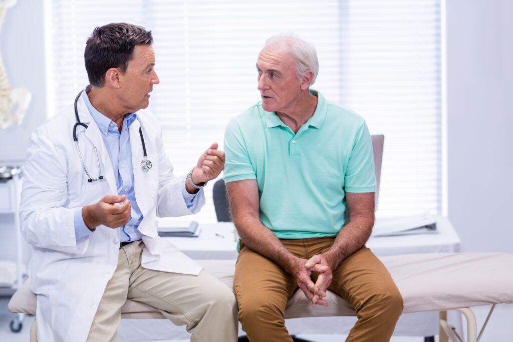 Doctor discussing GainsWave for erectile dysfunction during a consultation for erectile dysfunction treatment in Oklahoma